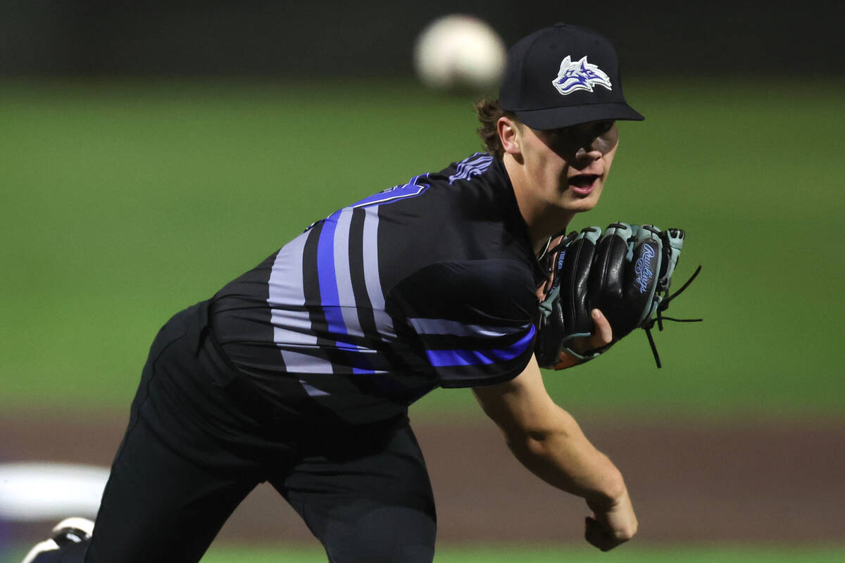 Basic pitcher Lincoln Evans throws to Bishop Gorman during a high school baseball game at Bisho ...