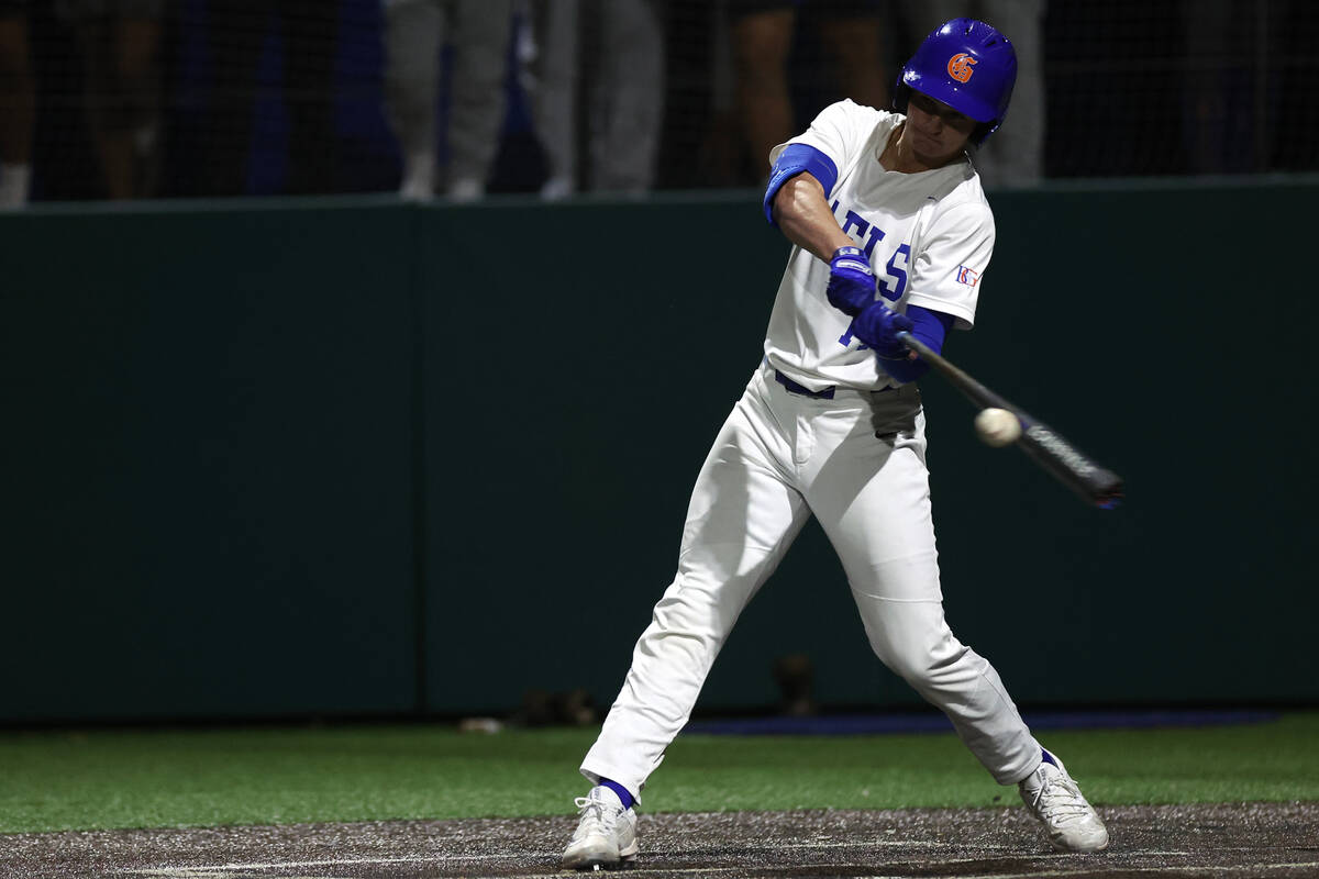 Bishop Gorman’s Nolan Eberwein bats against Basic during a high school baseball game at ...