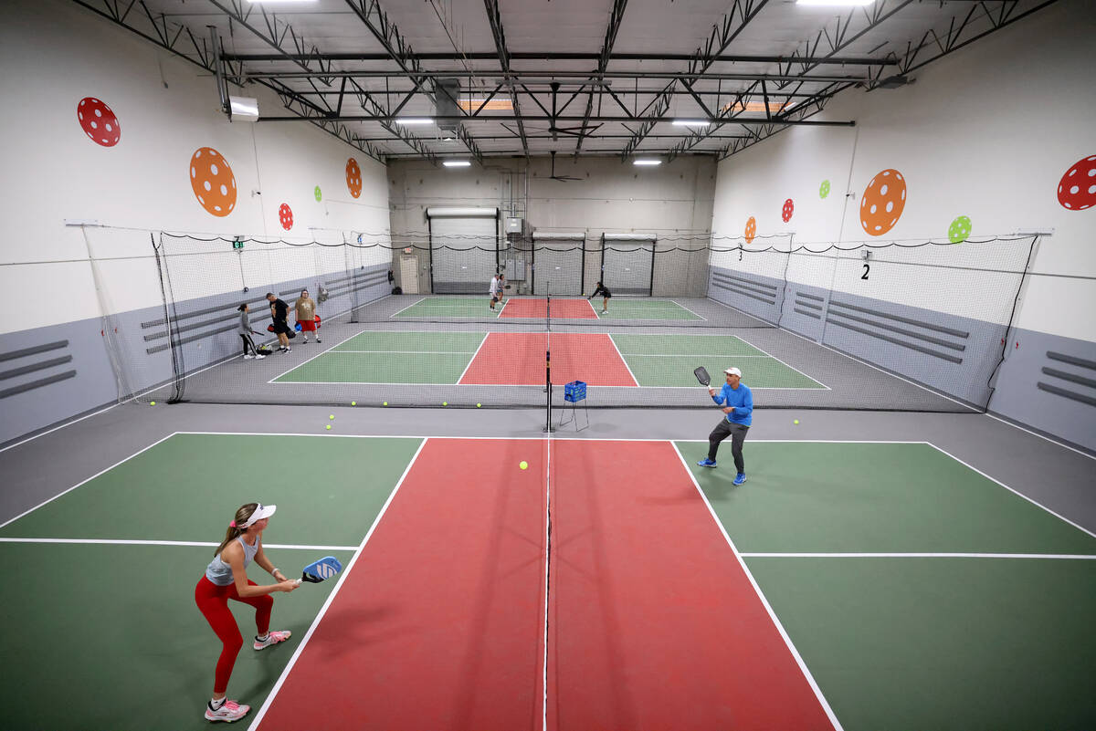 Darcy Shore, 16, plays against her fatherJosh Shore, 54, at Vegas Indoor Pickleball at 7575 W. ...