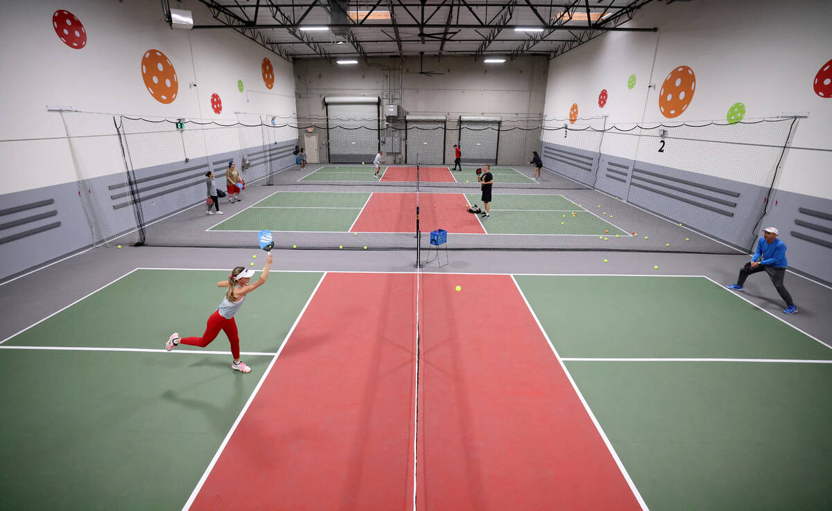 Darcy Shore plays against her father, Josh Shore, at Vegas Indoor Pickleball. (K.M. Cannon/Las ...