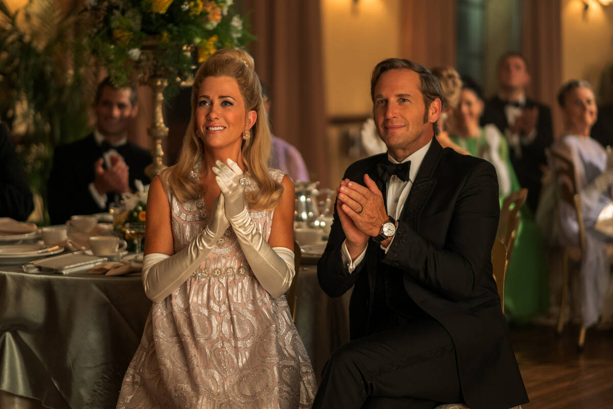 Josh Lucas with Kristen Wiig in a scene from "Palm Royale," now streaming on Apple TV ...