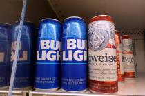 Bud Light, made by Anheuser-Busch, sits on a store shelf on July 27, 2023 in Miami. (Joe Raedle ...
