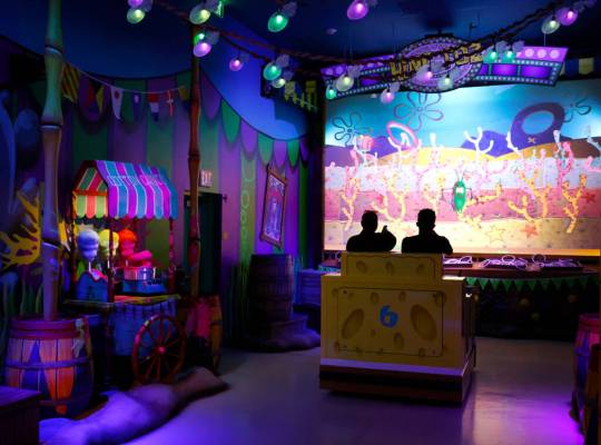 People experience SpongeBob's Crazy Carnaval Ride at Circus Circus on Friday, March 1, 2024, in ...