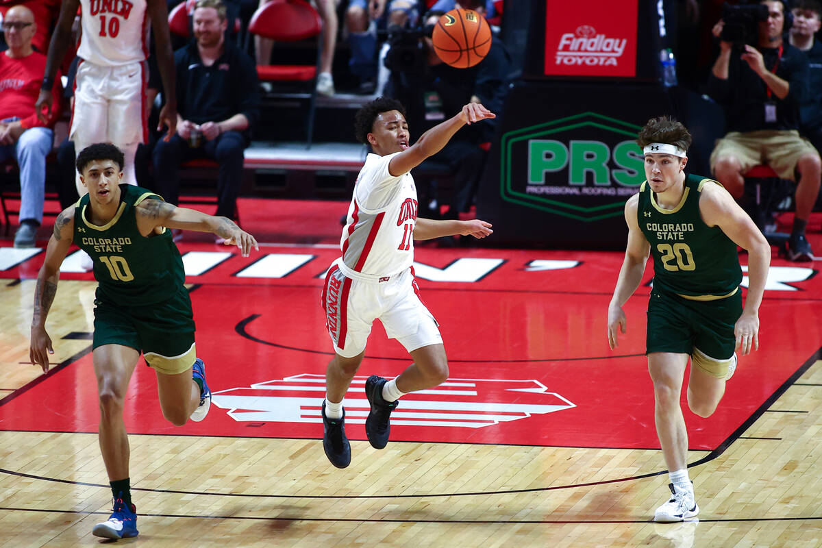 UNLV Rebels guard Dedan Thomas Jr. (11) passes while running up the court against Colorado Stat ...