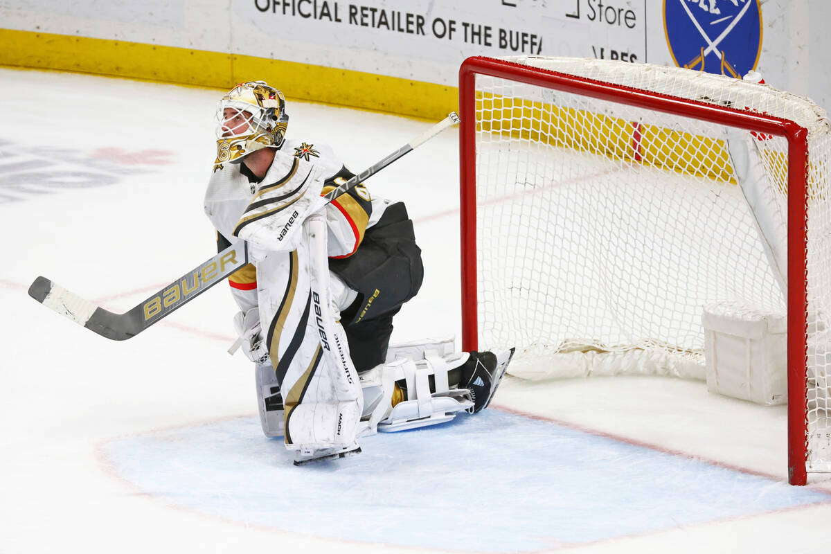 Vegas Golden Knights goaltender Logan Thompson (36) looks up at the scoreboard during the third ...