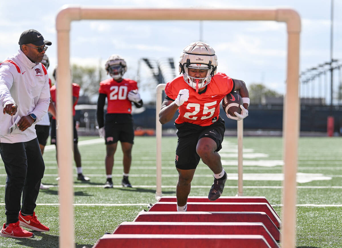 UNLV running back Rogerick Ray runs a drill during the first day of spring practice Saturday, M ...