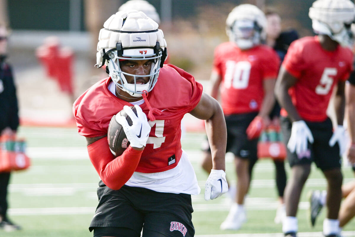 UNLV running back Darrien Jones runs the ball during the first day of spring practice Saturday, ...