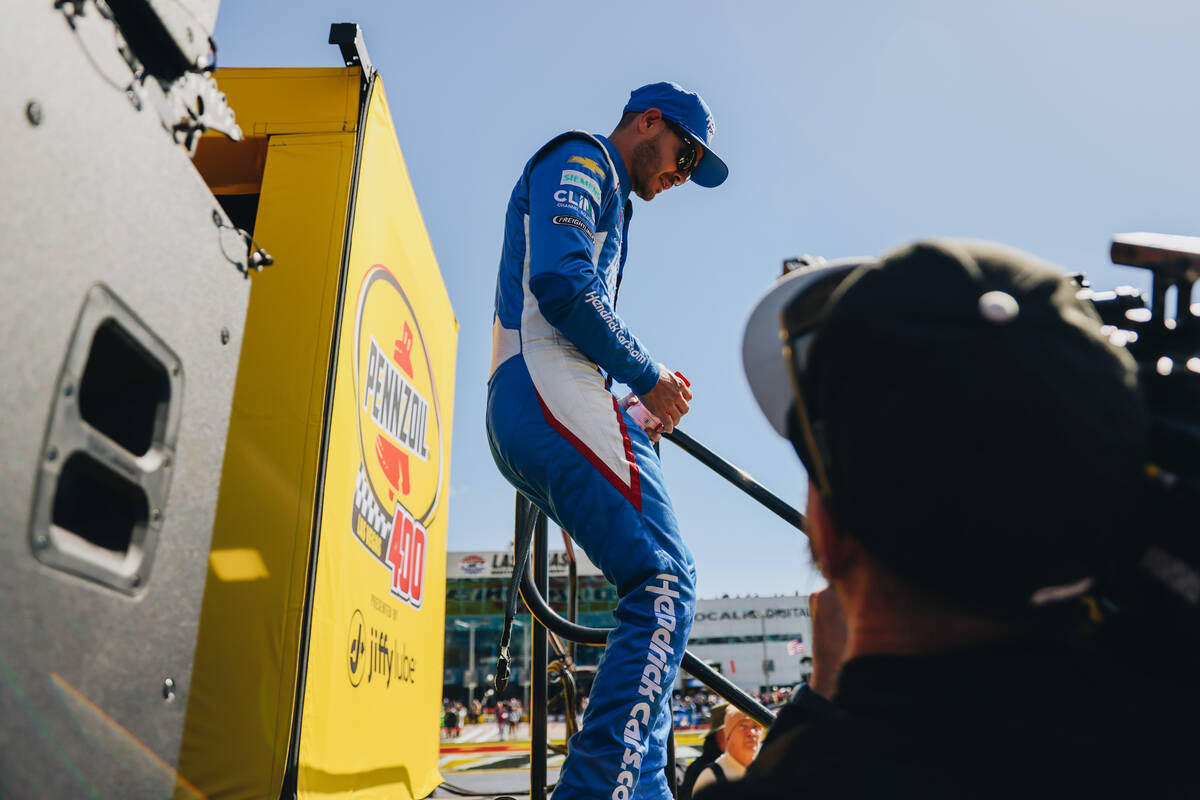Race driver Kyle Larson walks out during driver introductions at the Pennzoil 400 NASCAR Cup Se ...