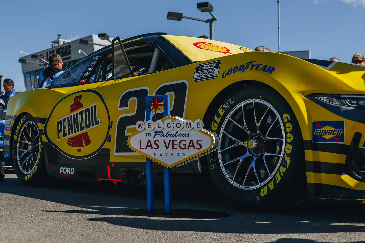 A “Welcome to Las Vegas” sign sits out in front of racer Joey Logando’s ca ...