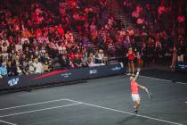 Rafael Nadal serves against Carlos Alcaraz at the Netflix Slam, at Michelob ULTRA Arena Mandala ...