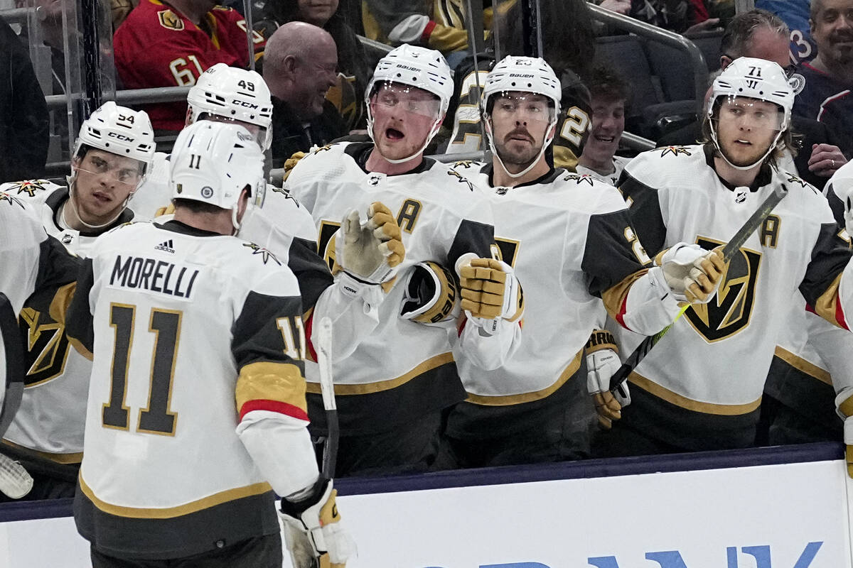 Vegas Golden Knights left wing Mason Morelli (11) celebrates after his goal with teammates in t ...