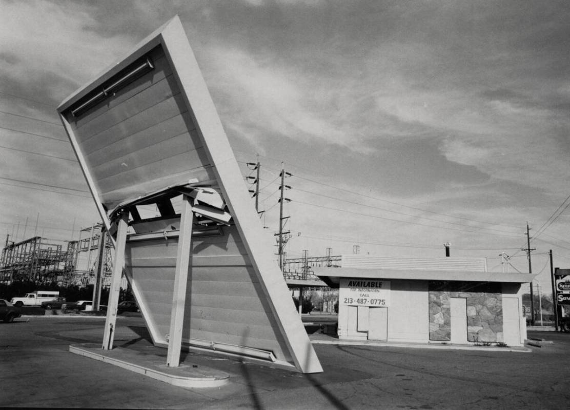 The awning of a gas station at Eastern Avenue and Bonanza Road is shown blown over by wind Dece ...