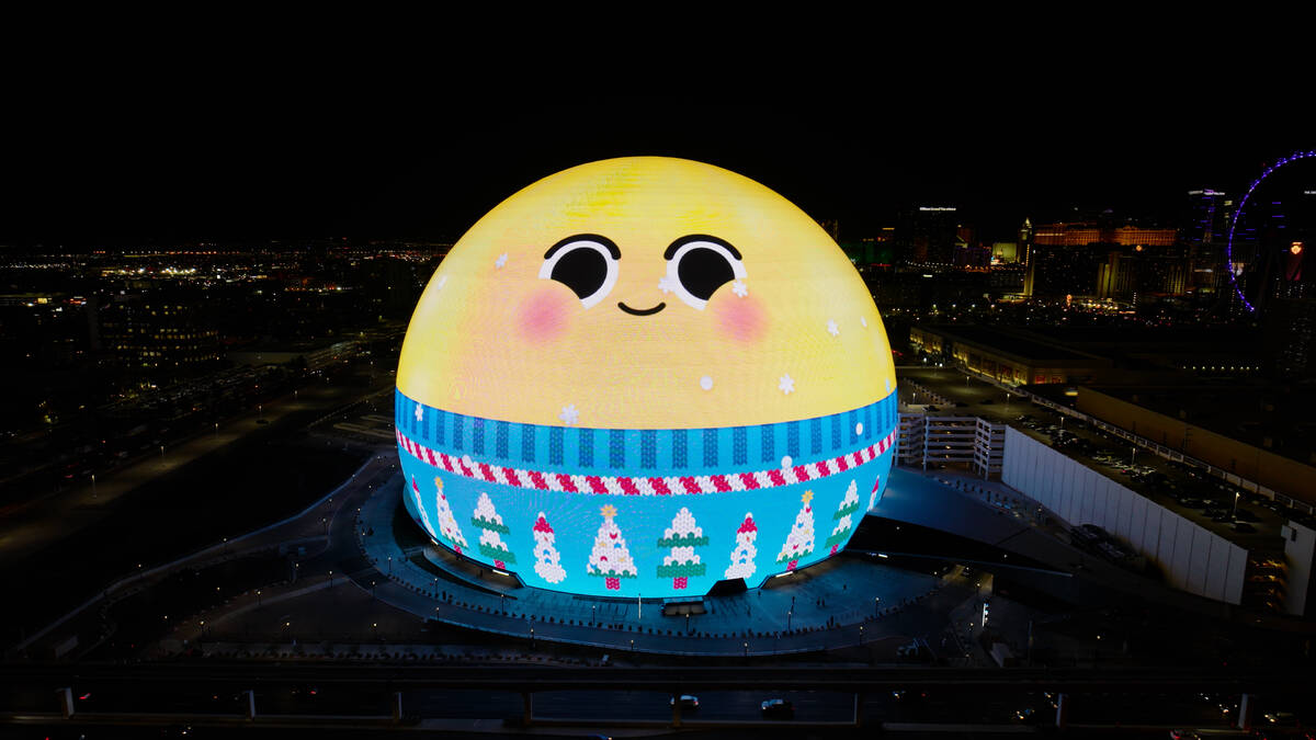 For the holidays, Emoji donned an ugly sweater and caught snowflakes on its tongue. (Sphere Ent ...