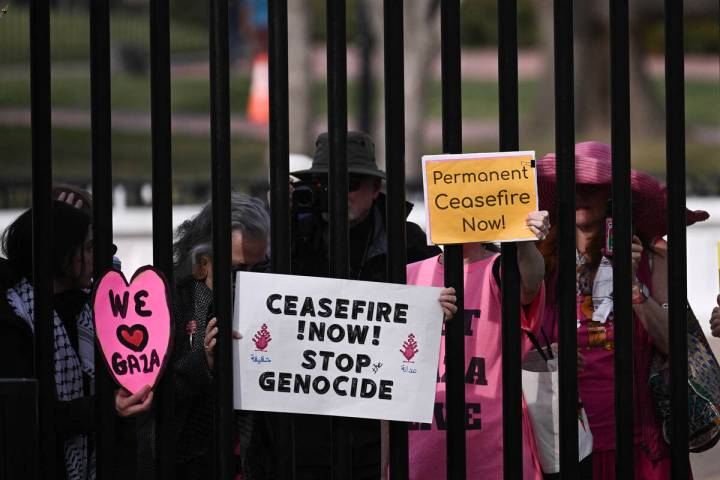 Protestors outside of the White House gates call for a ceasfire in Gaza on Monday, March 4, 202 ...