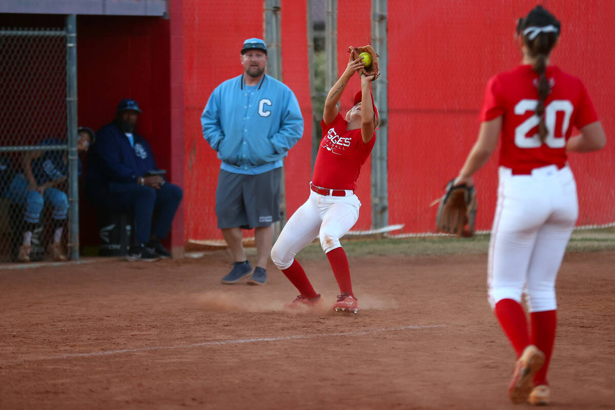 Arbor View third baseman Skylar Boehm catches for an out over Centennial during a high school s ...