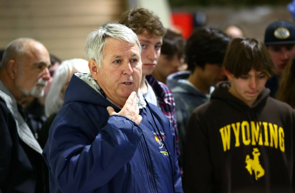 Michael Bolk, coach of the Boulder City Henderson swim team, who coached Charlie Clark for year ...