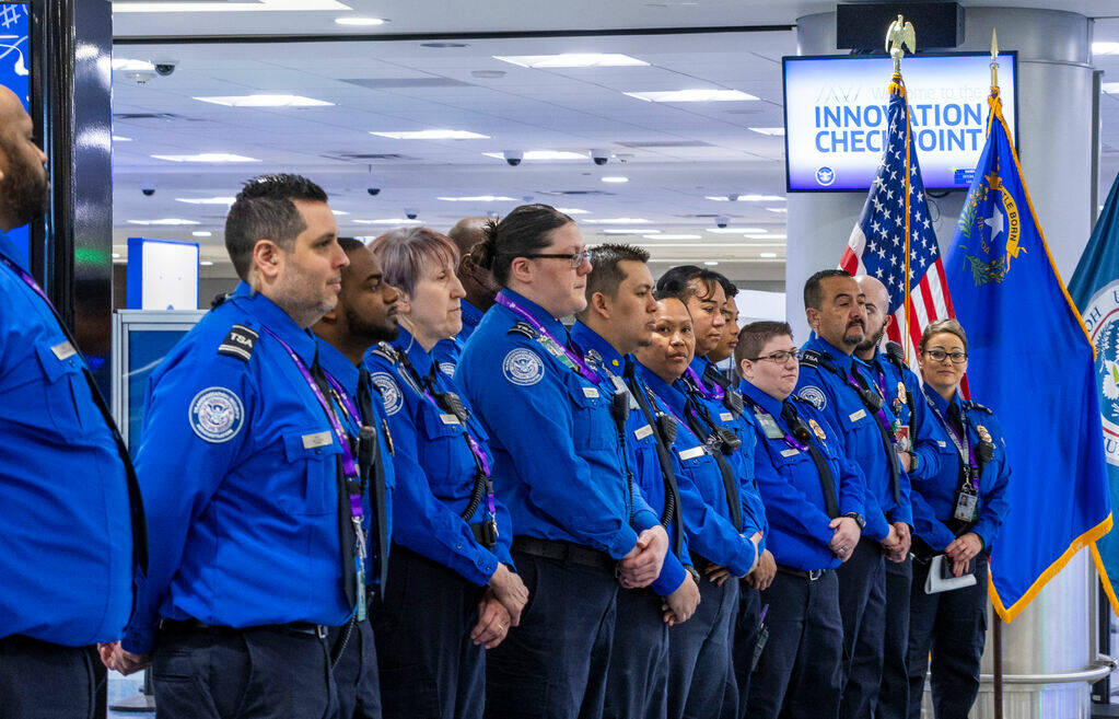 Transportation Security Administration agents gather as the TSA and the Science and Technology ...