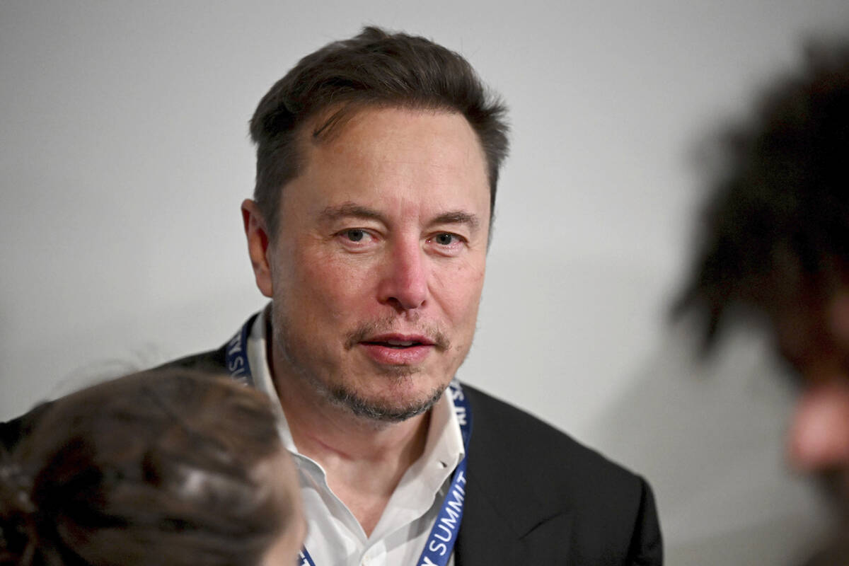 Tesla CEO Elon Musk attends the first plenary session of the AI Safety Summit at Bletchley Park ...