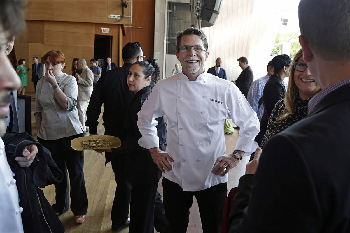 Chef Rick Bayless appears before a news conference Tuesday, May 20, 2014, in Chicago. (AP Photo ...