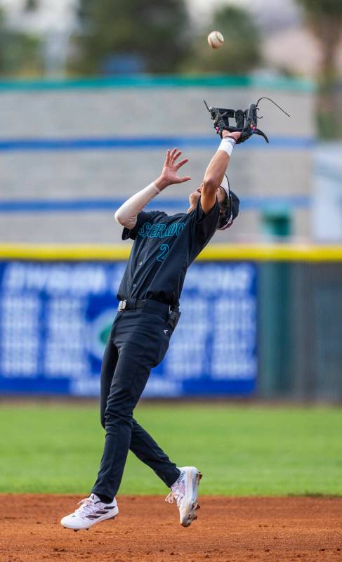 Silverado infielder Adam Rhodus (2) looks in a fly ball against Green Valley during their NIAA ...