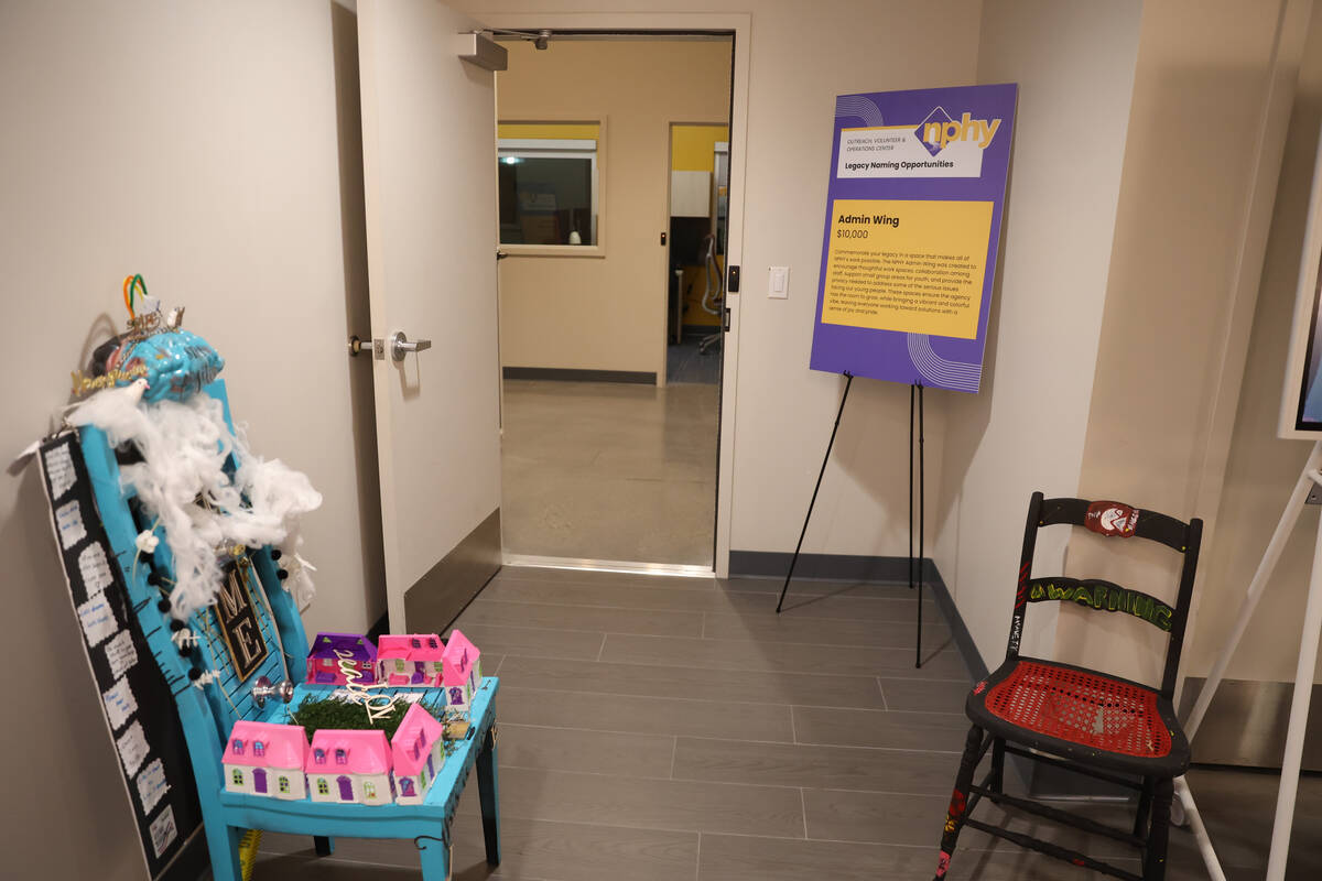 Artwork and a hallway of offices are seen inside of the Nevada Partnership for Homeless Youth O ...