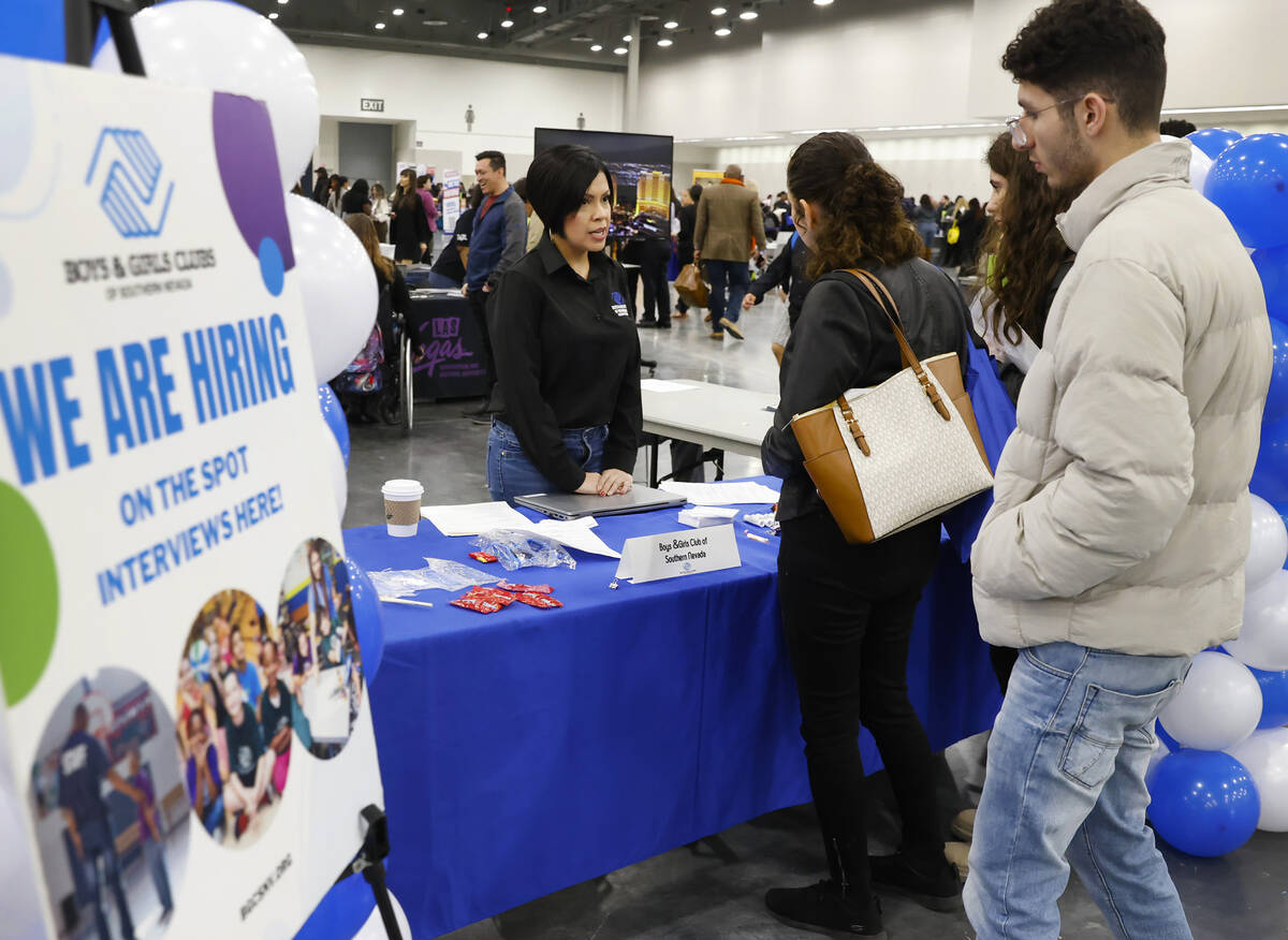 Yolanda Mationg, a director of HR at Boys and Girls Clubs of Southern Nevada, left, talks to jo ...