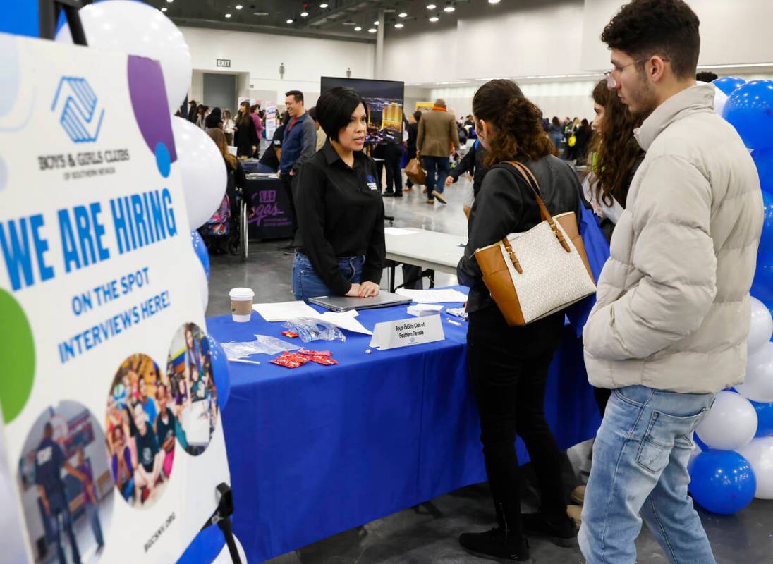 Yolanda Mationg, a director of HR at Boys and Girls Clubs of Southern Nevada, left, talks to jo ...