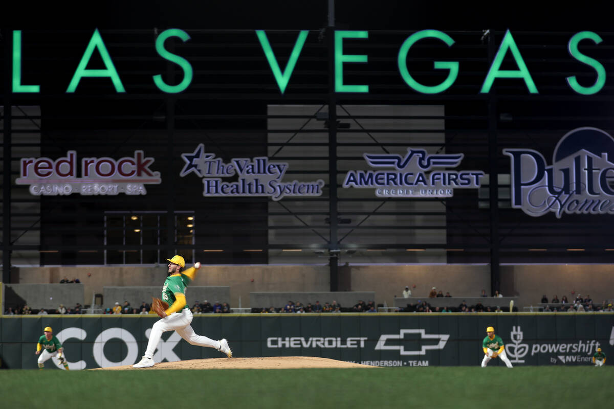 Oakland Athletics starting pitcher Mitch Spence (69) throws to the Milwaukee Brewers during a M ...