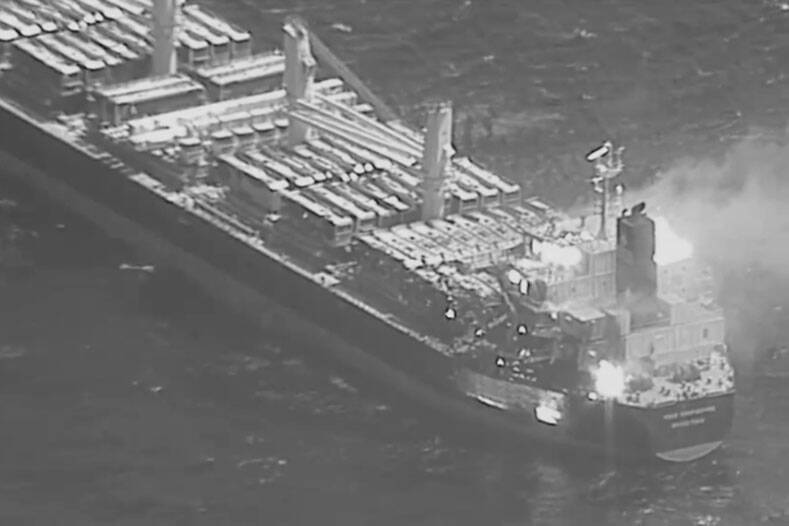 This black-and-white image released by the U.S. military's Central Command shows the fire aboar ...