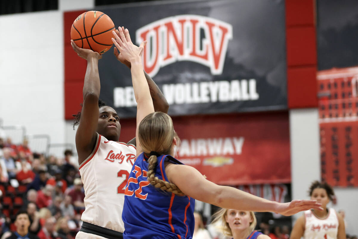 UNLV Lady Rebels center Desi-Rae Young (23) shoots against Boise State Broncos forward Trista H ...