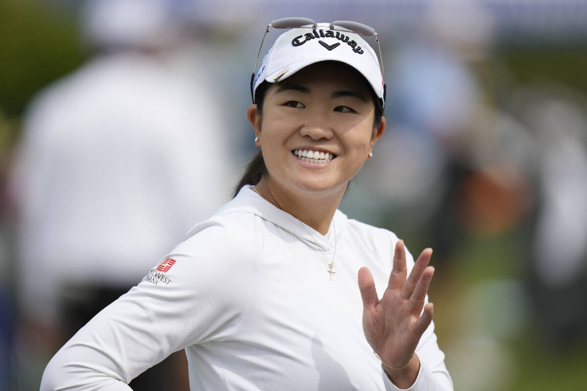 Rose Zhang waves on the driving range ahead of the Women's PGA Championship golf tournament, We ...