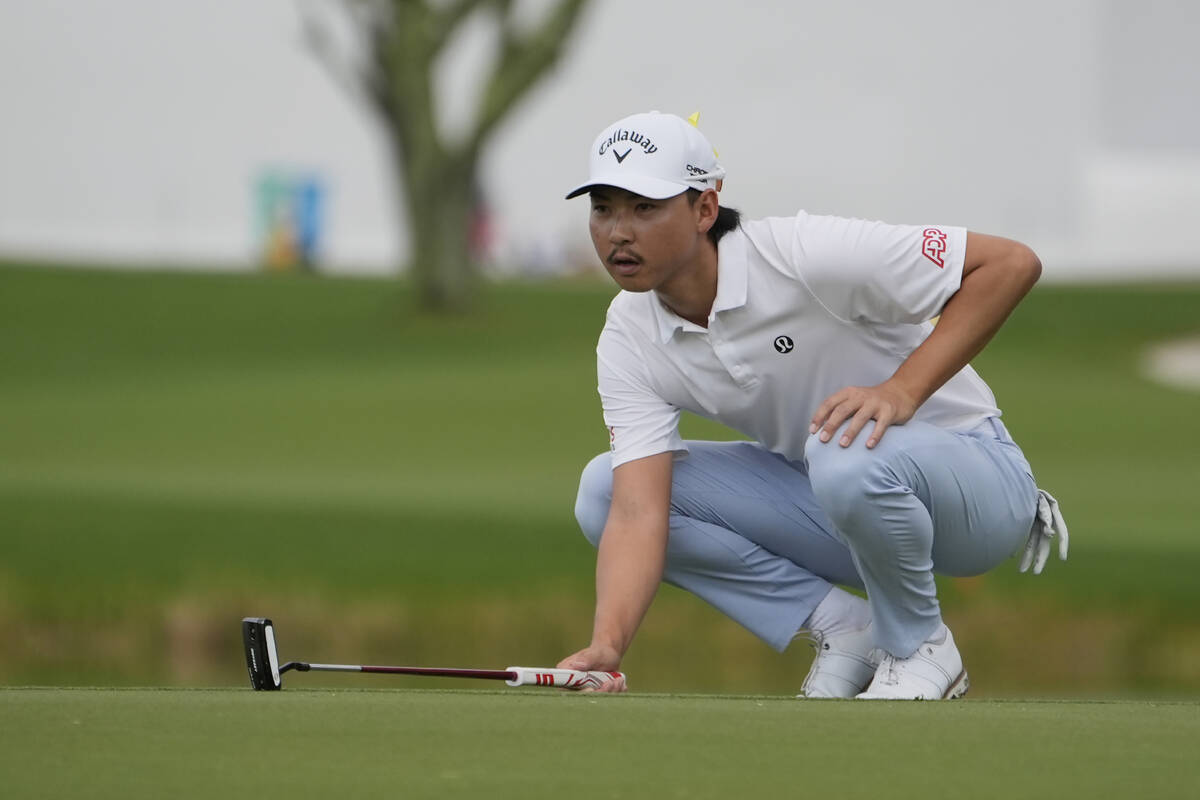 Min Woo Lee, of Australia, lines his shot on the third hole during the final round of the Cogni ...