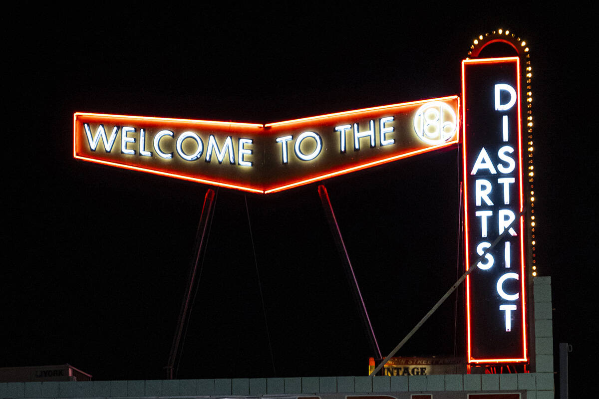 A sign for the Arts District is pictured on Main Street during First Friday in the Arts Distric ...