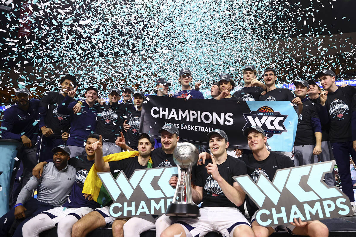 The St. Mary's Gaels celebrate after winning an NCAA college basketball championship game again ...