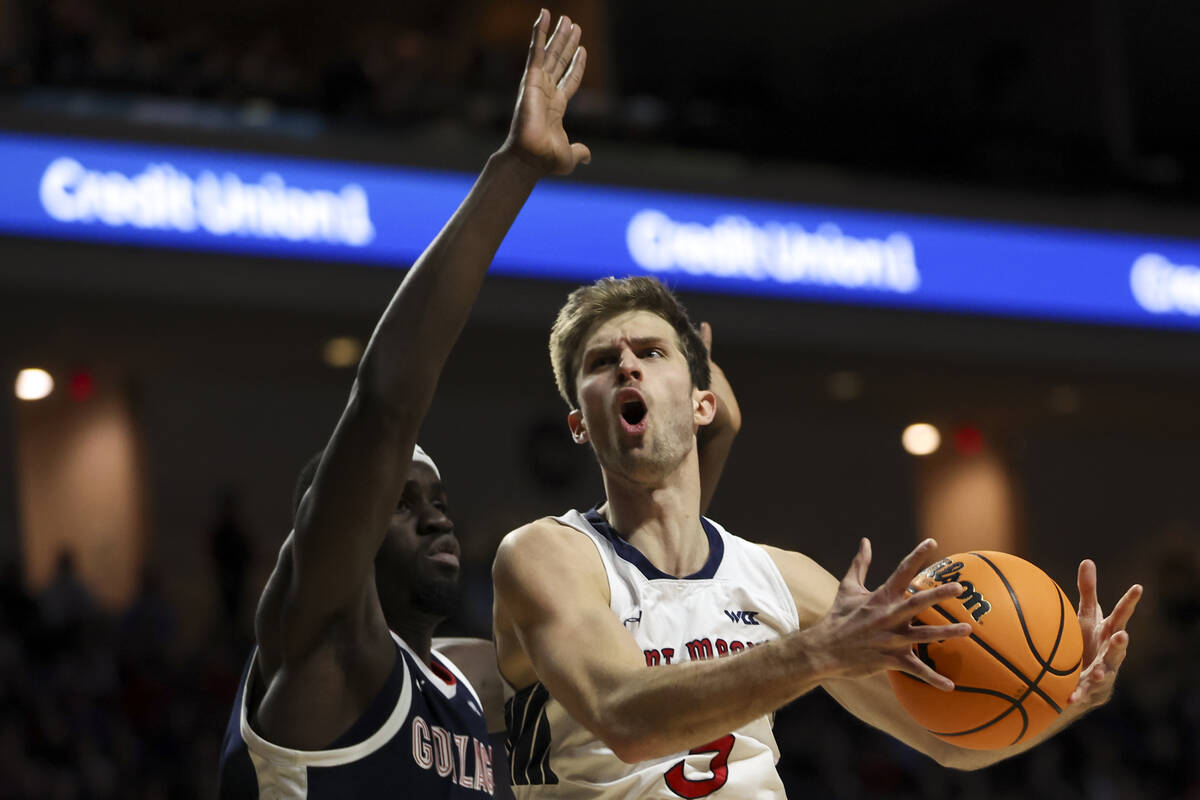 St. Mary's Gaels guard Augustas Marciulionis (3) drives toward the net against Gonzaga Bulldogs ...