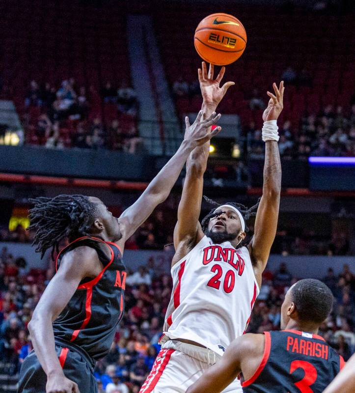 UNLV Rebels forward Keylan Boone (20) elevates for a shot over San Diego State Aztecs forward J ...