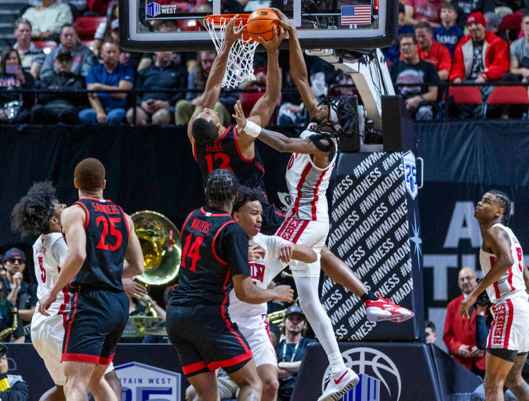 UNLV Rebels forward Keylan Boone (20) rejects a shot by San Diego State Aztecs forward Jaedon L ...