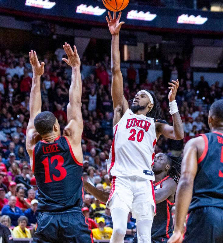 UNLV Rebels forward Keylan Boone (20) scores over San Diego State Aztecs forward Jaedon LeDee ( ...