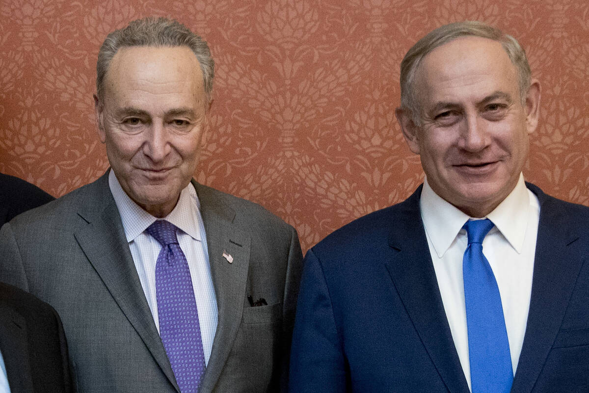 Israeli Prime Minister Benjamin Netanyahu, right, poses for a picture with Senate Minority Lead ...