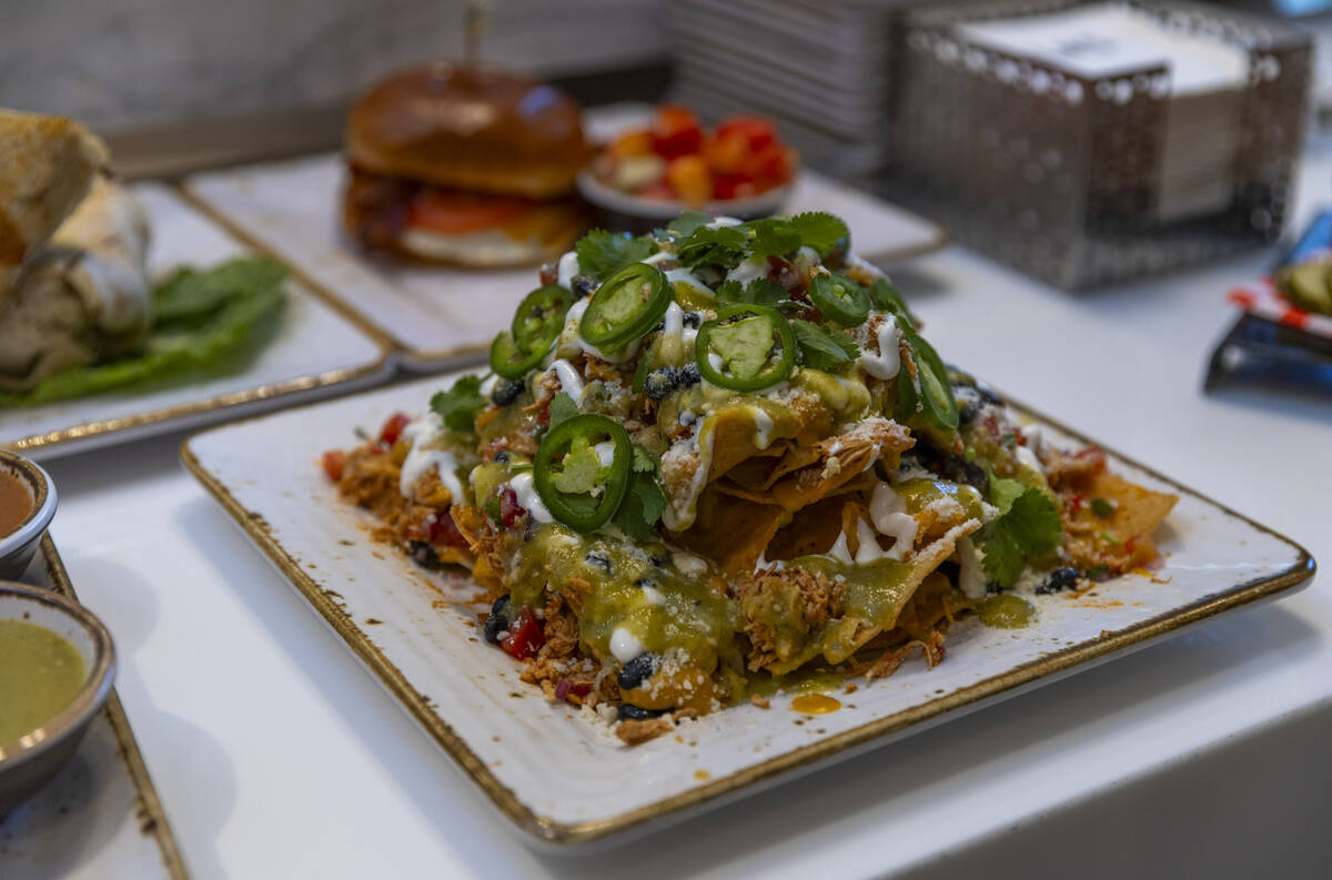 Some of the various food items being tasted to likely make the menu as Rock star Sammy Hagar is ...