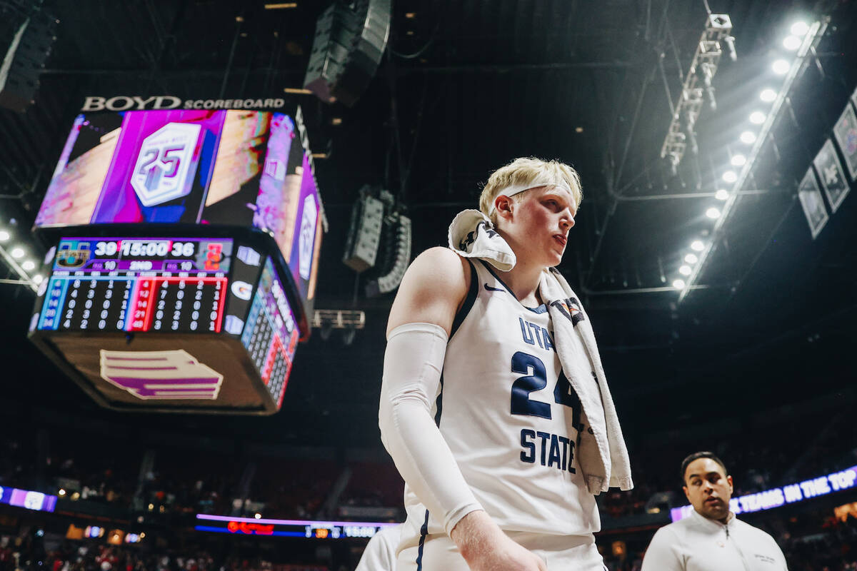 Utah State forward Karson Templin (24) walks back to the locker room at halftime during the Mou ...