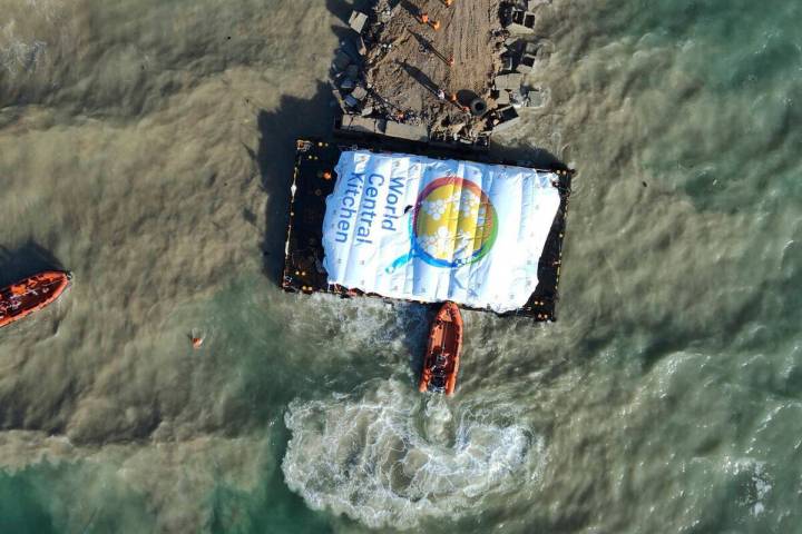 In this photo provided by the Israeli Army, humanitarian aid transported from a ship from the W ...