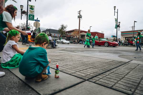 The St. Patrick’s Day parade makes its way through Water Street on Saturday, March 16, 2 ...