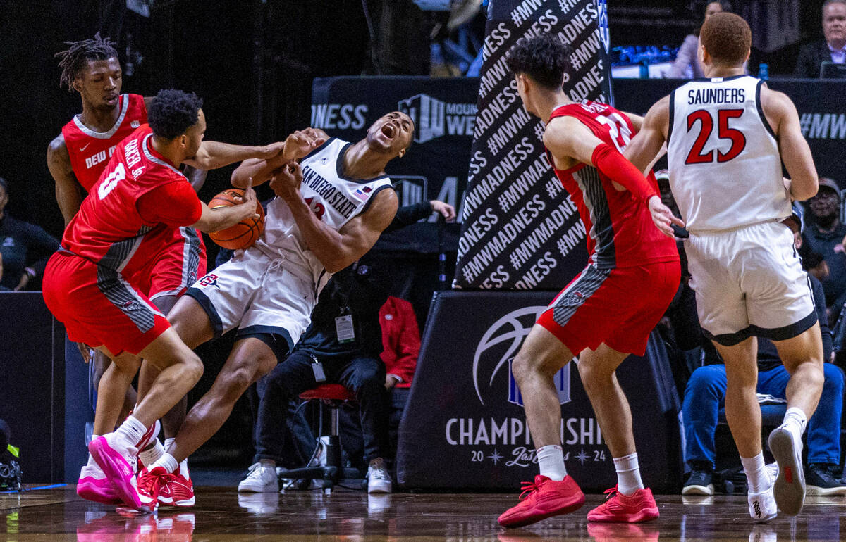 San Diego State Aztecs forward Jaedon LeDee (13) yells as he is fouled by New Mexico Lobos guar ...