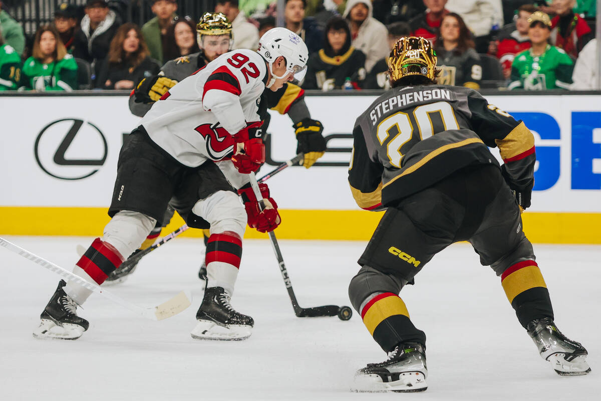 Golden Knights center Chandler Stephenson (20) skates towards the puck as New Jersey Devils lef ...