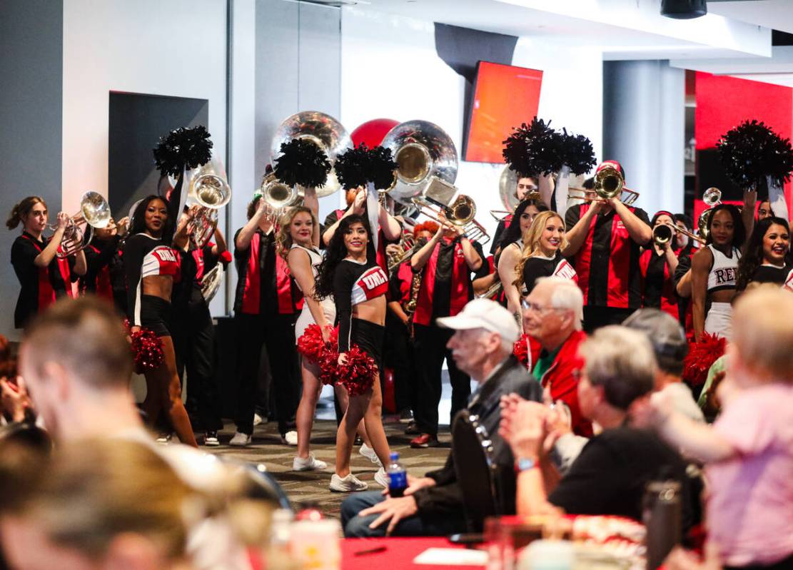 Cheerleaders cheer for the UNLV Lady Rebels basketball team after their placement was announced ...