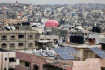 Humanitarian aid is airdropped to Palestinians in Gaza City, Gaza Strip, on Sunday, March 17, 2 ...