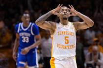 Tennessee guard Zakai Zeigler (5) reacts after hitting a 3-point basket during the second half ...