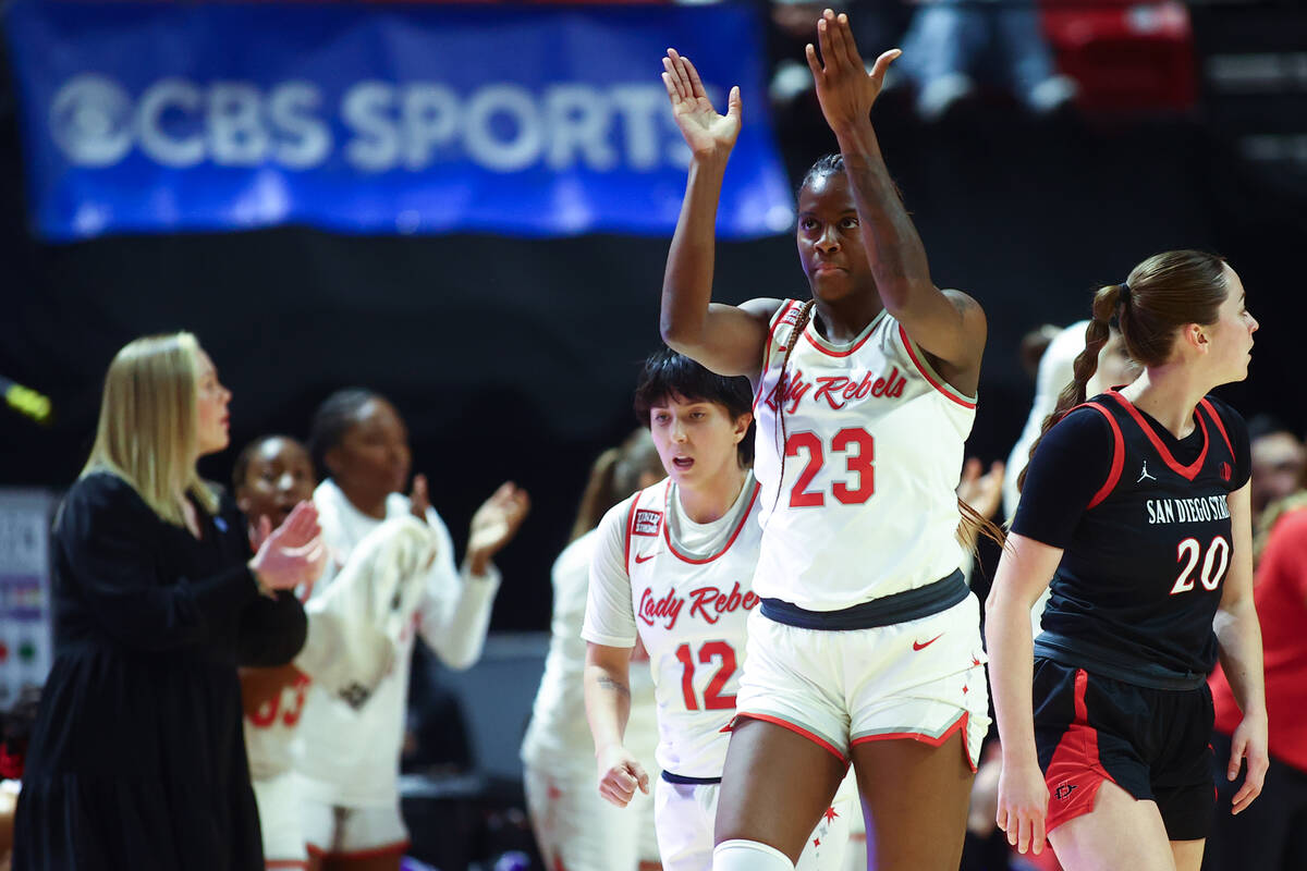 UNLV Lady Rebels center Desi-Rae Young (23) applauds after forcing the San Diego State Aztecs i ...