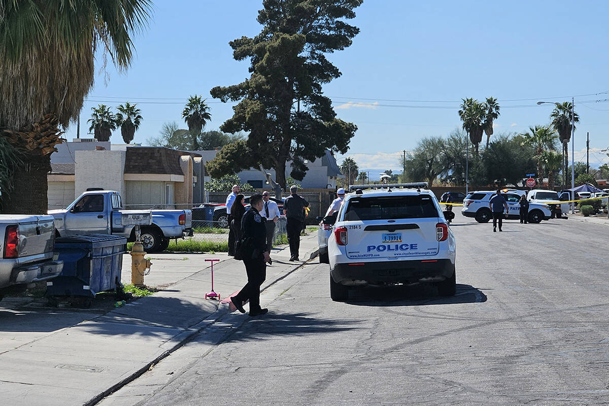 Police investigate the shooting deaths of two women Tuesday, March 19, 2024, on the 2000 block ...